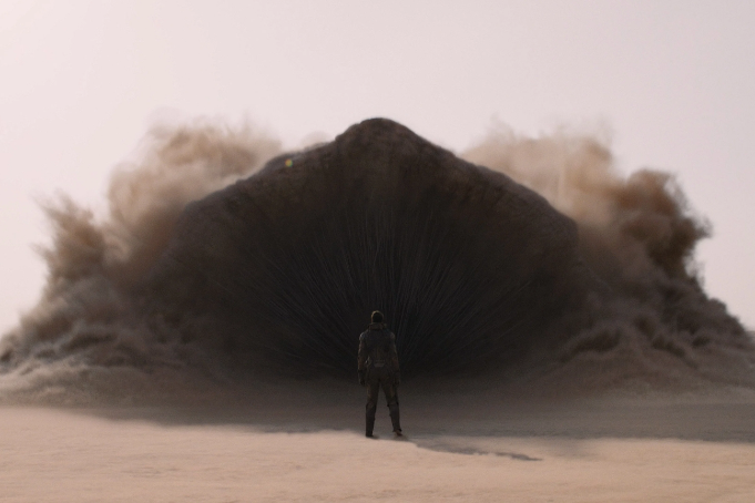 Zendaya as Chani standing before Shai Hulud (sandworm) in Dune: Part Three (Warner Bros. Pictures)